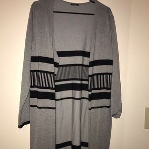 Black and grey cardigan lightly worn !!